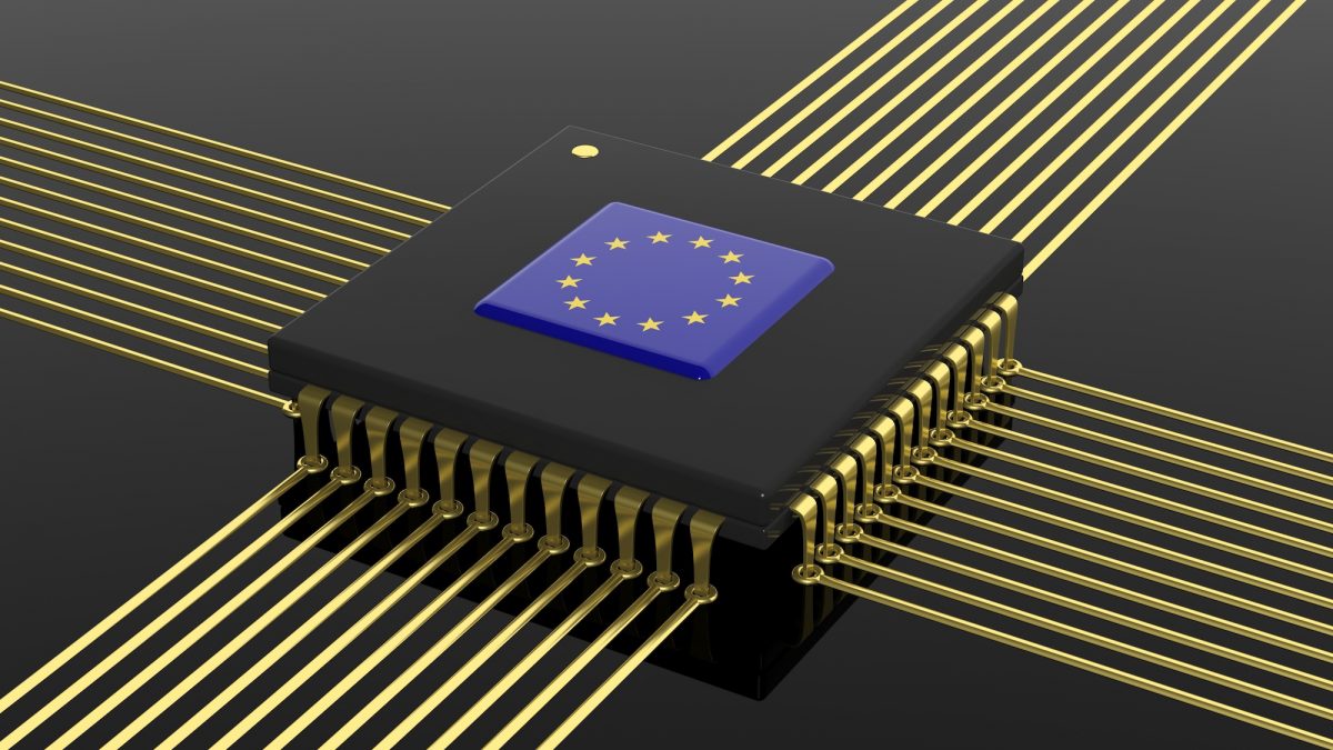 Computer CPU with EU flag isolated on black background